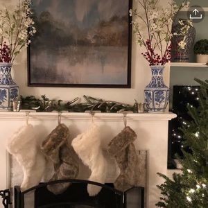 Four faux fur Christmas stockings